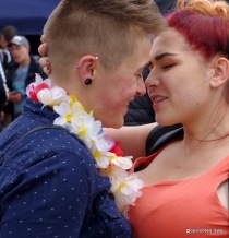 Two women looking into each other's eyes about to kiss